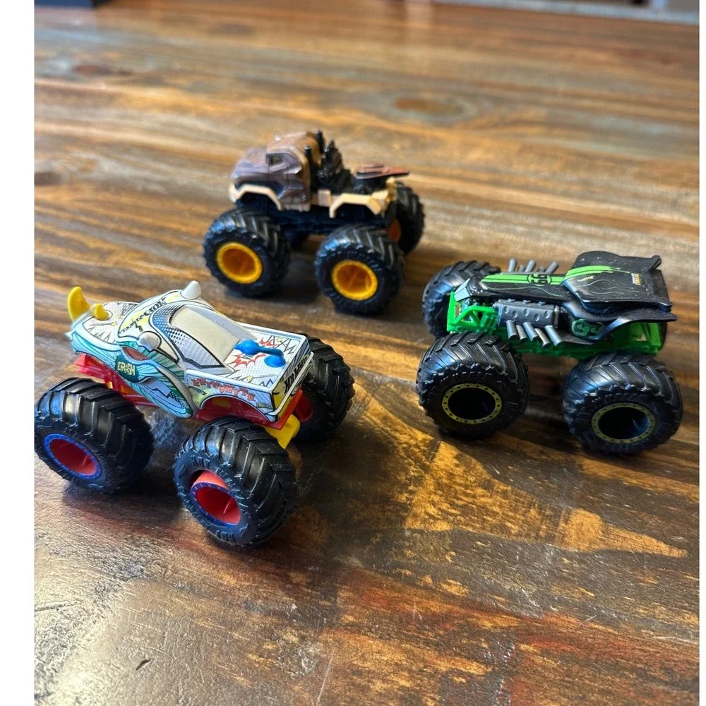 Monster Jam Truck HotWheel Lot of 3 1:64  Rhinomite Jurassic World Radical Racer
